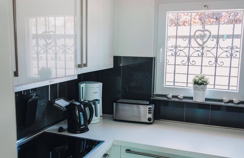 Lensterstrand House | Holiday Home 'Haus Piratennest' with Terrace, Garden & Wi-Fi