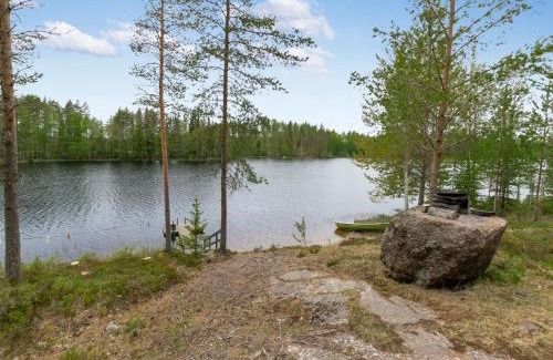 Rautalampi House | Holiday Home Kierinniemi by Interhome