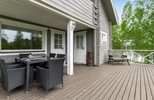 Rautalampi House | Holiday Home Kierinniemi by Interhome