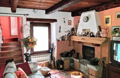 Ceppo Morelli House | Holiday home Situated in a quiet location in the mountains on the edge of the river with a view of the forest
