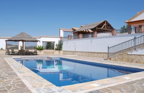Iznajar House | Holiday house Iznajar for 2 - 8 persons with 4 bedrooms - Row house