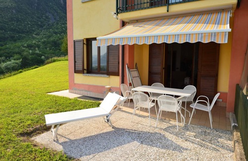 Rogno House | Holiday house terraced villa with large garden
