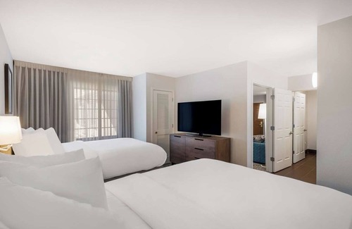 Lone Tree Hotel | Home Away From Home - Spacious Suite with Living Space | Outdoor Pool