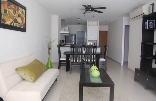 Puerto Juarez Apartment | HOME OFFICE?.ENJOY IT AT CANCUN, AFFORDABLE NICE BEACHFRONT CONDO.
