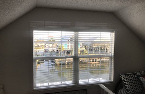 Silver Cay House | Home on water w/boat dock. 3 bed, 3 bath. Sleeps 9. Sunsets, beaches, fishing.