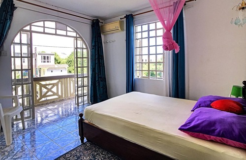 Calodyne Apartment | Homerez - Appartement for 4 ppl. with garden, terrace and balcony at Calodyne