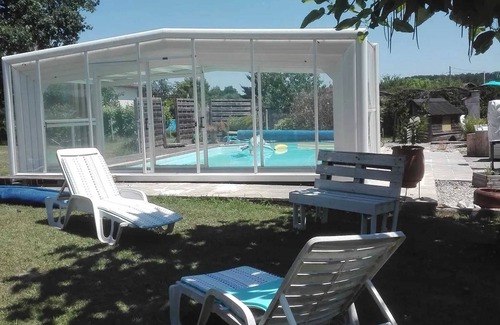 Eymet Ski Chalet | Homerez - Charming Chalet with Shared Pool in Eymet