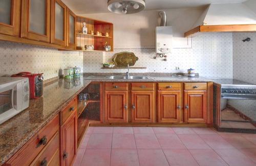 Sao Joao Batista House | Homerez - Charming House in Porto de Mós with Shared Pool