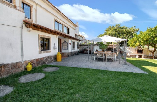 Sao Joao Batista House | Homerez - Charming House in Porto de Mós with Shared Pool