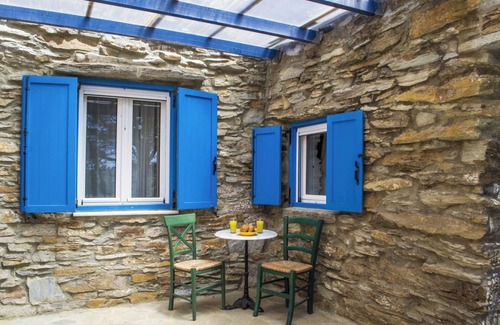 Ioulida House | Homerez - Charming House in Kastanies with Fireplace and View