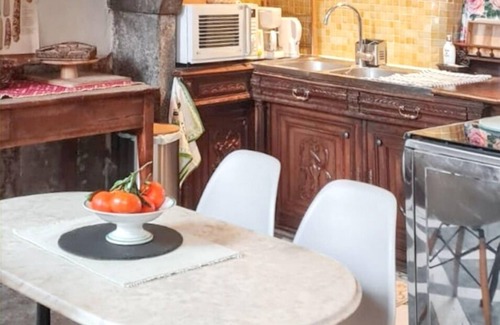 Mauzun House | Homerez - Charming House in Mauzun with Garden and Flowered Patio