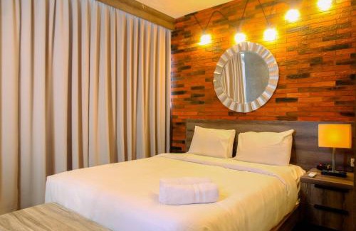 Pondokcina Apartment | Homey 1BR at 15th Floor Apartment at Atlanta Residences By Travelio