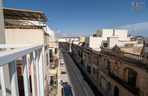 Birkirkara Apartment | Homey 1BR home with Balcony in Heart of Malta by 360 Estates