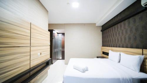 Surabaya Apartment | Homey and Cozy Living 2BR Apartment at Aryaduta Residence Surabaya By Travelio