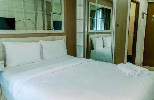 Kayu Putih Apartment | Homey and Warm Studio Room at Tifolia Apartment By Travelio
