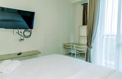 Kayu Putih Apartment | Homey and Warm Studio Room at Tifolia Apartment By Travelio