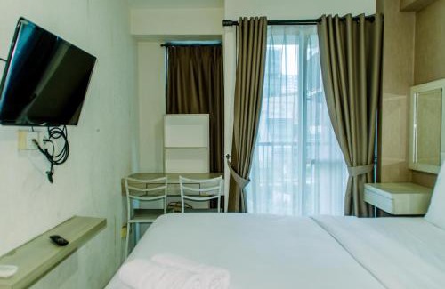 Kayu Putih Apartment | Homey and Warm Studio Room at Tifolia Apartment By Travelio