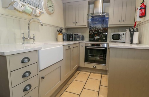 Staintondale Cottage | HONEY BEE COTTAGE, pet friendly, with open fire in Staintondale