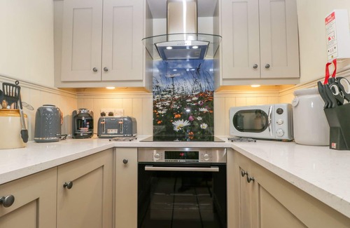 Staintondale Cottage | HONEY BEE COTTAGE, pet friendly, with open fire in Staintondale