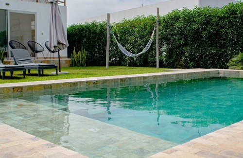 Ica Villa | HOP Praia: Modern Home with Lagoon View