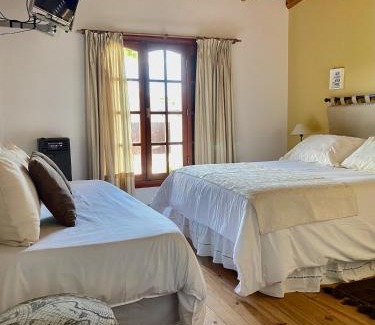 Las Grutas Hotel | HOSTERIA ISABEL Departamentos y Habitaciones con baño privado