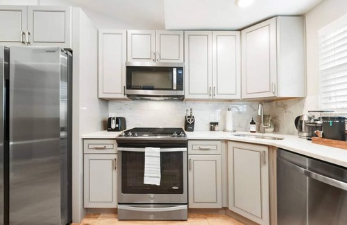 Lower Lawrenceville House | ★ HostWise Stays ★ Off-Street Parking, <1 block from Butler, Patio, Great Space!