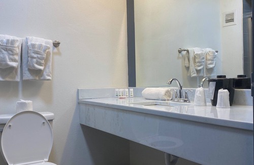 Pines Village Hotel | Hotel 10 Extended Stay