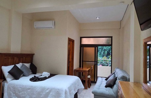 San Felipe Hotel | Hotel del Bosque San Felipe Retalhuelu