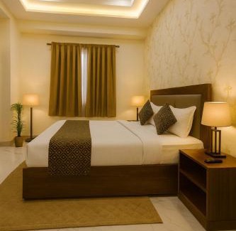 Deoghar Hotel | Hotel Krishna Palace, Vrindavan - Lavish & Luxury rooms with parking near prem mandir #By Om #