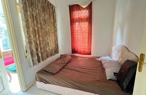 Cipanas Hotel | Hotel O Puncak Resort Guest House