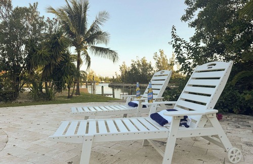 Smith's Point House | House on the canal with pool 10 min walk from beach. Fishing dream come true.
