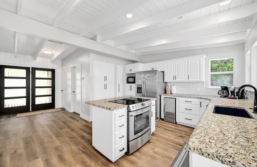 Sunrise Beach Village House | Huge Waterfront Home on Lake Lbj with Pool, HotTub, Island, Boat Ramp and Slips