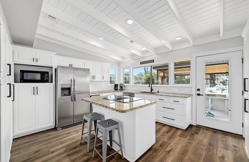Sunrise Beach Village House | Huge Waterfront Home on Lake Lbj with Pool, HotTub, Island, Boat Ramp and Slips