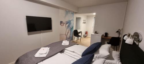 Husnes House | Husnes Sentrum Hotell