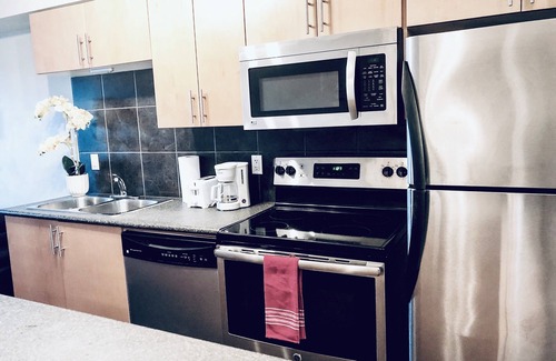 Downtown Edmonton Condo | ICE District 2BDRM A/C Condo W/Laundry + U/Parking