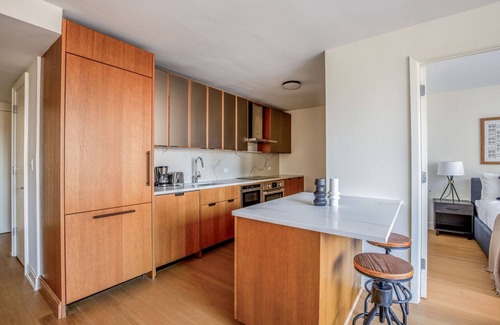 Sutton Place Apartment | Ideal Midtown East 2BR w/Gym & Roofdeck, nr Parks, by Blueground
