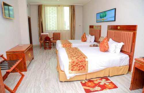 Kisutu Hotel | Ideally located at the City Centre, 5 Minutes walk to the Ferry.