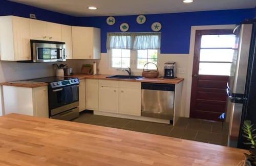 Ewell Cottage | IDLE HOUR, a tranquil 3 bedroom 1.5 bath cottage WITH DOCK