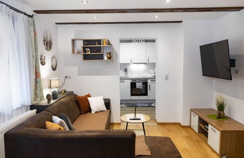 Langkampfen Apartment | Idyllically situated apartment, 800m to the ski bus