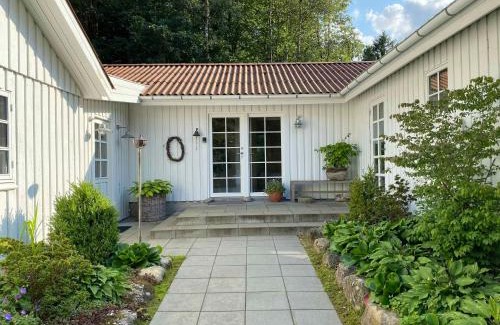 Viborg House | Idyllically Situated Wooden House By The Forest