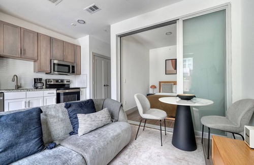 Waller Creek District Apartment | Impeccable Downtown 1BR w/Deck, nr Convention Center, by Blueground