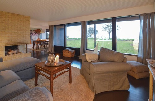 Faxe Ladeplads House | In the first row to the water lies the cozy cottage.