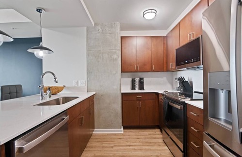 Midtown Apartment | Indulge in stylish living at our ideal location, perfect for relaxation and exploration of the city's offerings