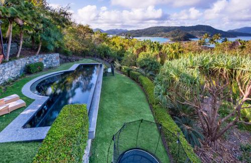 Hamilton Island House | Indulge in the Lap of Luxury, Iluka is Your Private Ocean-view Haven on Half an Acre with Infinity Pool and Two Golf Buggies