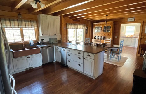 East Chop House | Indulge in the ultimate vacation experience at this exquisite custom log home.