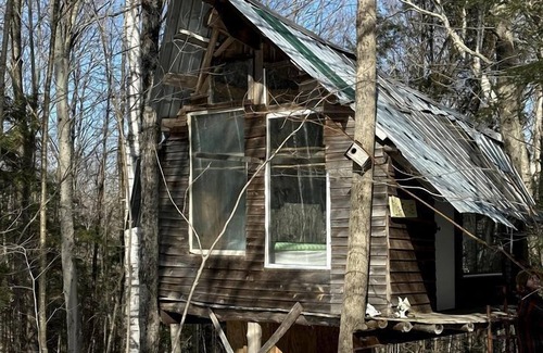 Dorchester RV Rental | Into the Woods: Discover Our Charming Rustic Treehouse in Dorchester, NH