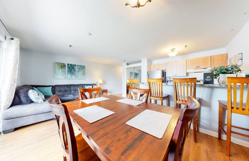 Gilford Condo | Inviting condo in quiet locale with partial lake views, balcony & grilling area