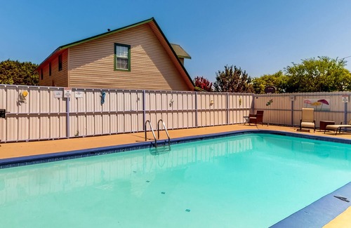 Laguna Park House | Inviting dog-friendly apartment with patio, W/D, & shared pool, hot tub