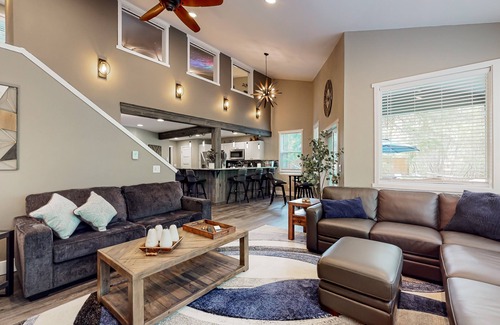 Mason County House | Inviting riverfront home with hot tub, firepit, W/D, & dog-friendly