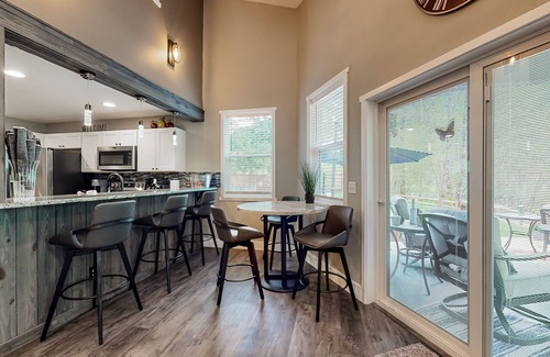 Mason County House | Inviting riverfront home with hot tub, firepit, W/D, & dog-friendly